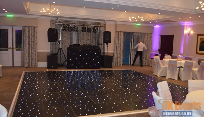 uplighters, dance floor and sparkly black LED dance floor