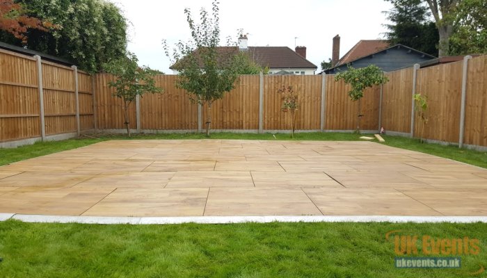 an outdoor dance floor designed to be used on grass area